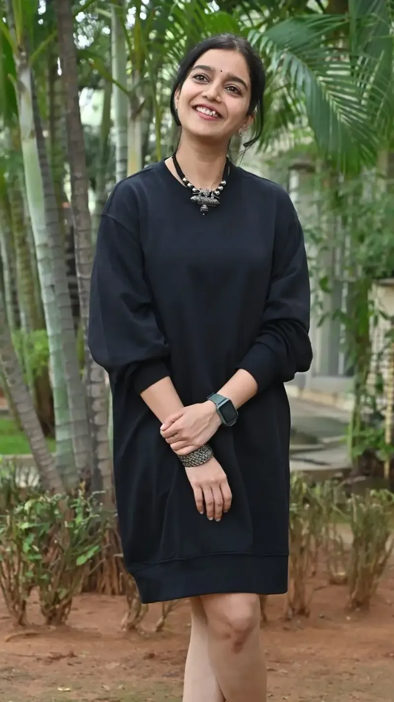 Actress Colors Swathi in Black Dress at Month Of Madhu Movie Press Meet